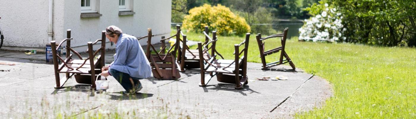 Painting benches outside 